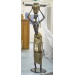 BRONZE SCULPTURE, Hagenauer style bronze and gilt metal of an African female figure on oval base,