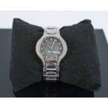 EBEL A LADIES DIAMOND SET STAINLESS STEEL QUARTZ WRIST WATCH.