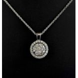 A DIAMOND MICRO SET CLUSTER PENDANT ON CHAIN, 18K white gold.