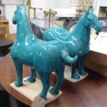 TANG STYLE HORSES, a pair, blue glazed finish, 50cm H.