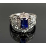 A SAPPHIRE AND DIAMOND DRESS RING, mounted in platinum, (0.23 diamond, 2.47 sapphire).