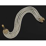 FRENCH DIAMONDS, SAPPHIRE AND CULTURED PEARL BRACELET, 18 carat gold, of five rows.