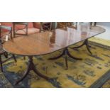 TRIPLE PILLAR DINING TABLE, Regency style mahogany with rounded ends,