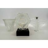 LALIQUE FRANCE, a frosted glass vase, a bowl an Art Deco style candlestick, a swan ring stand.