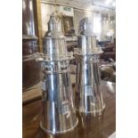 BOSTON LIGHTHOUSE STYLE COCKTAIL SHAKERS, a pair, after the International silver Co, 37cm H.