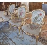 FAUTEUILS, a set of four, 19th century giltwood with floral needlework upholstery,