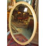 WALL MIRROR, John Linnell style oval gilt with a guilloche decorated frame, 104cm W x 141cm H.