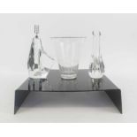 BACCARAT, an antique etched glass vase, a Baccarat stem vase and a Daum candlestick.