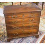 BACHELOR'S CHEST, George III figured mahogany, with brushing slide above four long drawers,