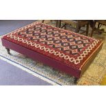 HEARTH STOOL, carpet and red leather upholstered, 134cm x 92cm.