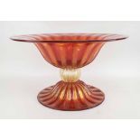 A MASSIVE MURANO GLASS BOWL, by Zora Davenazin of Art Deco style orangy red and clear with gold,