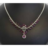 1960'S RUBY AND DIAMOND NECKLACE, mounted in 18 carat white gold, approx weight of diamonds 3.