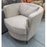 ARMCHAIR, of curved form in flecked upholstery, 77cm W.