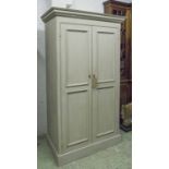 ARMOIRE, French style traditionally grey painted with two panelled doors enclosing hanging,