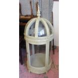VITRINE, cream in the form of a lantern with a turned finial, domed top and glazed panels,