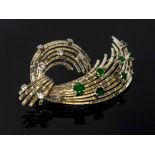 EMERALD AND DIAMOND BROOCH, circa 1960 of stylised feather design mounted in 18k white gold,