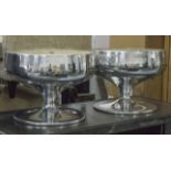 BOWLS, a pair, silvered metal circular, each 64cm Diam.