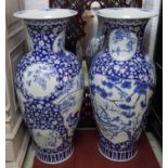 TALL VASES, a pair, Chinese blue and white ceramic, with lids, 105cm H.