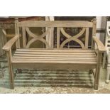 LATTICE GARDEN BENCH, weathered teak with slatted seat and X lattice back, 132cm W.