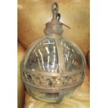 GLOBE LANTERN, in a bronzed frame, 56cm diam. plus chain.