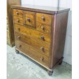 CHEST, Victorian teak with a deep bonnet drawer and two short above three long drawers on bun feet,