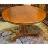 BREAKFAST TABLE, Victorian mahogany with circular tilt top on trefoil base, 72cm H x 104cm.