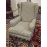 WING ARMCHAIR, Georgian style in ticking upholstery with seat cushion, 66cm W.