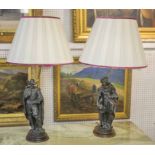 TABLE LAMPS, a pair, spelter modelled as Rembrandt and Rubens with cream pleated shades, 80cm H.