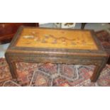 CHINESE LOW TABLE, camphorwood with soapstone with carved flowerhead decoration and figures,
