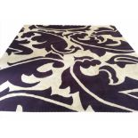 RUG COMPANY CARPET, 280cm x 277cm, of large acanthus design in amethyst and ivory.