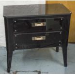 BEDSIDE CHESTS, a pair, ebonised each with two drawers and glass, 77cm W x 74cm H x 41cm D.