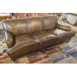 SOFA, brown leather upholstered with three seat cushions, 208cm W.