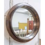 WALL MIRROR, circular in a wooden frame, with applied metal digits '100', 84cm diam.