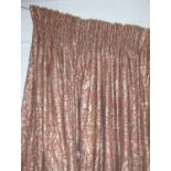 CURTAINS, three in gold and brown foliate pattern, 107cm gathered by 285cm dropped.