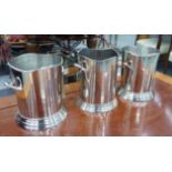 CHAMPAGNE BUCKETS, a set of three, stamped Louis Roederer, 24cm H.