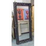 WALL MIRROR, rectangular bevelled plate in a swept black frame, 194cm x 89cm.