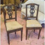 SIDE CHAIRS, a pair, 18th century Italian walnut with carved splats and distressed seats.