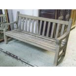 'LISTER' ESTATE BENCH, substantial weathered teak slatted by 'Lister', 184cm W.