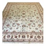 FINE TABRIZ DESIGN CARPET, 310cm X 235cm, of scrolling vines and palmettes on pale jade field.