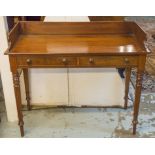 WRITING TABLE, Victorian mahogany with ¾ galleried top above two drawers, 89cm H x 107cm W x 50cm D.