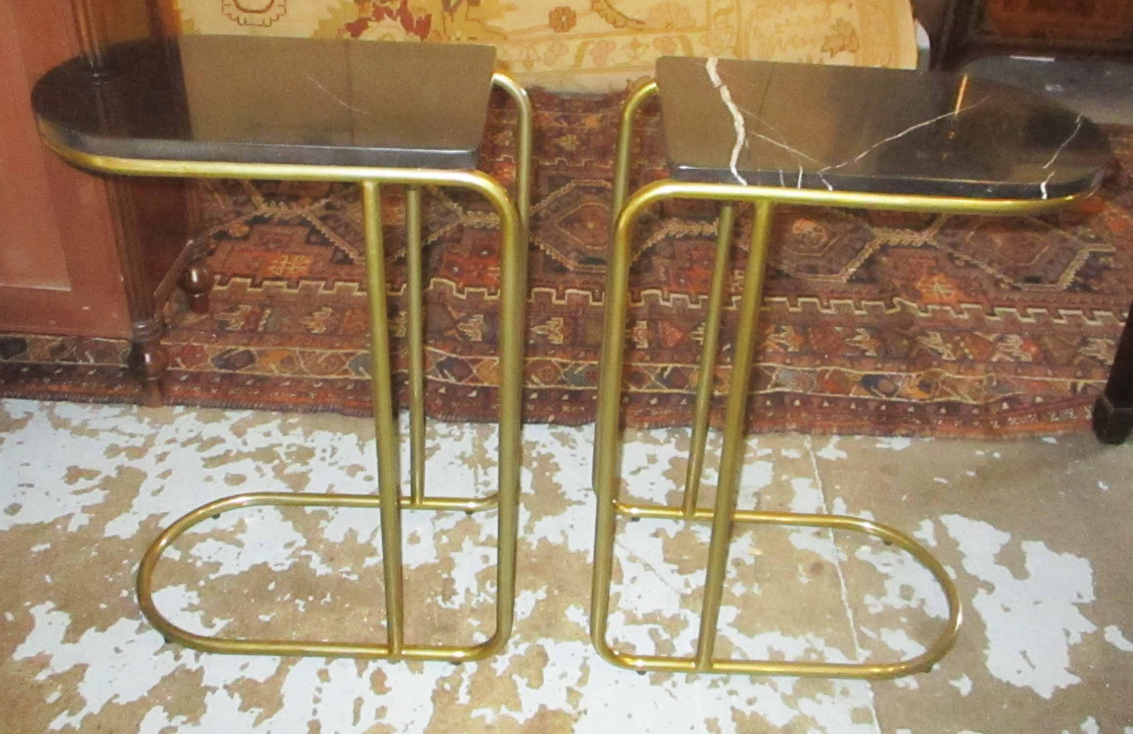 LOW OCCASIONAL TABLES, a pair, each gilt metal framed with a black and white veined marble top,