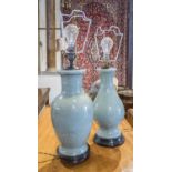 TABLE LAMPS, two, Chinese celadon, one 35cm H, the other 38cm H and a gilt painted table lamp,