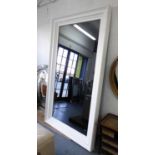 MIRROR, vintage American, smoked glass plate with later white painted frame, 245cm x 136cm.