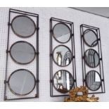 WALL MOUNTED OF THREE SWIVEL MIRRORS, a set of three, in a bronzed frame, 90cm x 34cm.