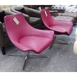 MATTEO GRASSI SWIVEL CHAIRS, a pair, in burgundy leather, each 87cm x 81cm H.