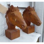 CONTEMPORARY SCHOOL, two decorative pieces, 'Heads of the Stallions', 31cm H.