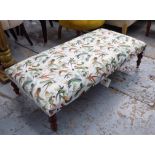 LOW HEARTH STOOL, with humming bird decorated fabric, on turned castor supports,