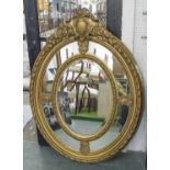 WALL MIRROR, Louis XVI style, gilt framed, with oval and marginal plates,