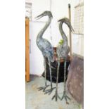 BRONZE ORIENTAL GARDEN CRANES, a pair, male and female, vintage,