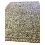 FINE KASHAN 'MOON' CARPET, 366cm x 270cm, of scrolling vines and palmettes, on jade field,